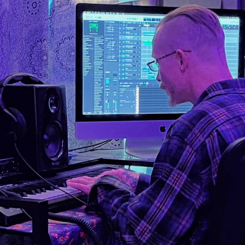 Jay Miller tracking on Logic Pro DAW and MIDI keyboard